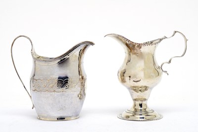 Lot 148 - Two Georgian silver milk jugs