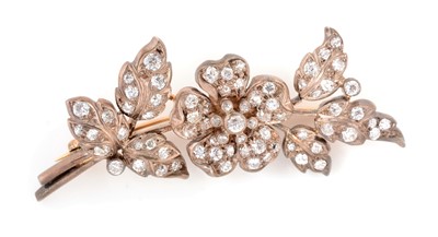 Lot 107 - A late 19th Century diamond set flower brooch
