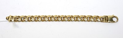 Lot 30 - A 9ct gold double curb-link bracelet.