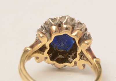Lot 113 - A sapphire and diamond cluster ring