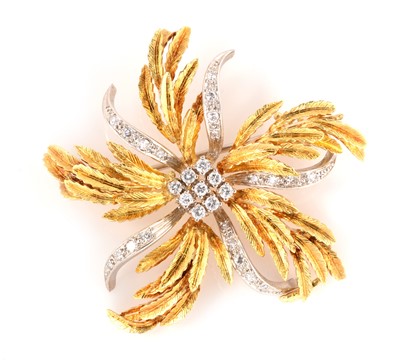 Lot 114 - Diamond set flower pattern brooch