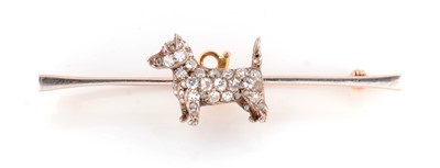 Lot 116 - A diamond set terrier pattern bar brooch
