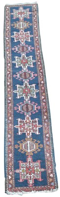 Lot 409 - A Heriz runner