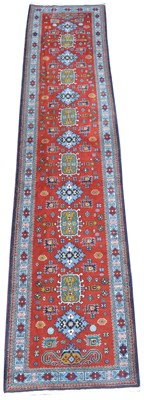 Lot 387 - A Caucasian runner