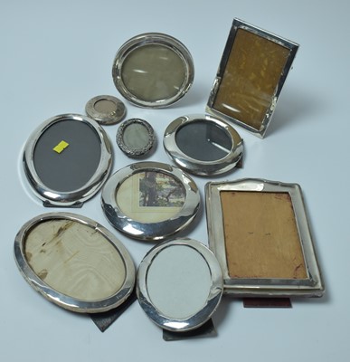 Lot 175 - A large group of ten silver photograph frames