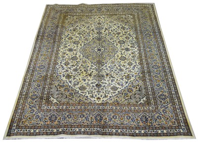 Lot 390 - A Kashan carpet