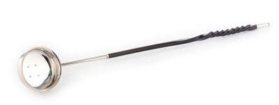 Lot 134 - A George III Scottish baleen-handled silver toddy ladle.