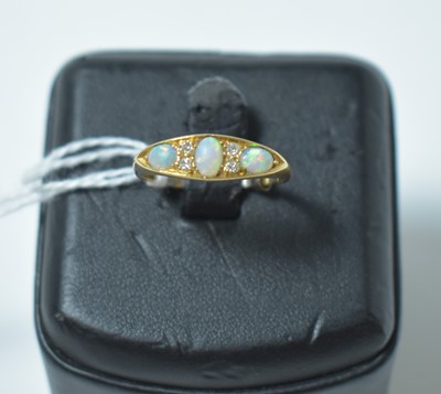 Lot 241 - An early 20th Century opal and diamond ring