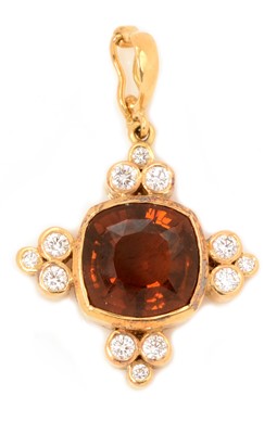 Lot 73 - An Imperial Topaz and diamond pendant