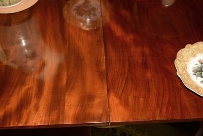Lot 666 - Early 20th Century mahogany triple pedestal dining table