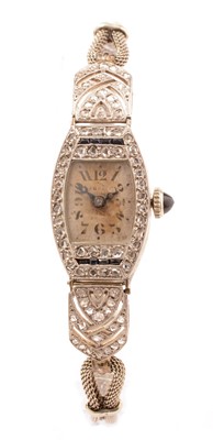 Lot 11 - A French Art Deco diamond and sapphire set cocktail watch
