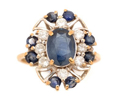 Lot 77 - A sapphire and diamond dress ring