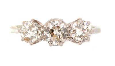 Lot 79 - A three-stone diamond ring