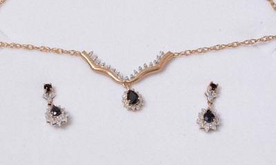 Lot 258 - A contemporary sapphire and diamond demi-parure.