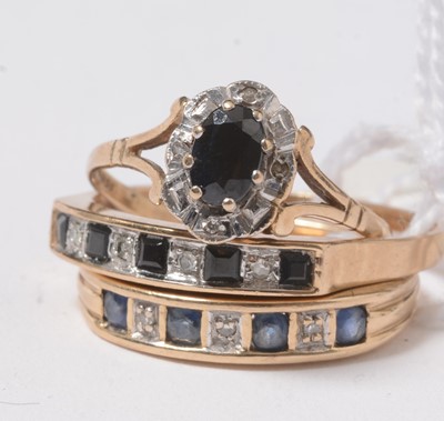 Lot 250 - Three sapphire and diamond rings.