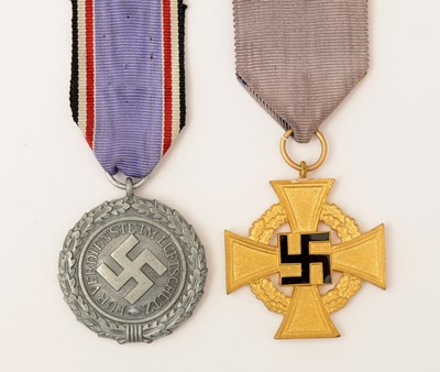 Lot 1120 - WWII German Air Defence medal, 1938 and a Faithful Service medal, first class