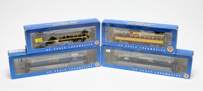 Lot 694 - Four Bachmann HO-gauge boxed trains.
