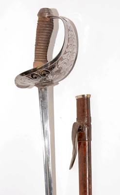 Lot 1069 - WWI Cavalry Officer's sword, 1912 pattern, and effects