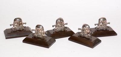 Lot 1195 - A set of five George V Royal Lancers silver menu stands