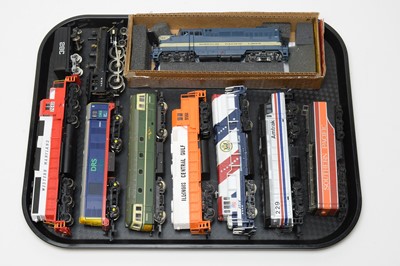 Lot 730 - Eight HO-gauge unboxed trains and tenders.
