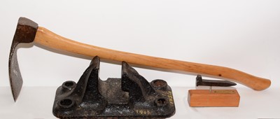 Lot 1216 - An early 20th-century cast-iron track chair and other railwayana