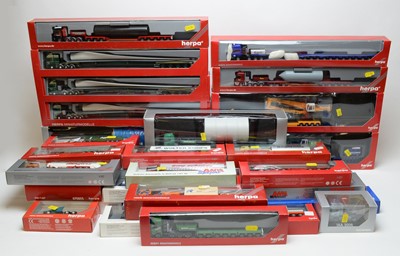 Lot 910 - A quantity of boxed Herpa, Italeri and other commercial trucks.