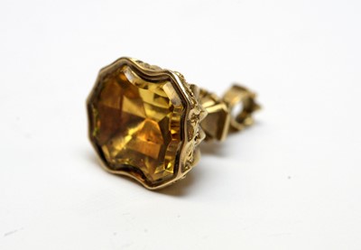 Lot 22 - A 19th Century yellow metal and citrine fob seal.