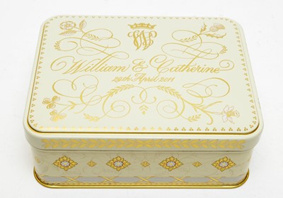 Lot 1335 - A slice of wedding cake from the marriage of TRH The Duke and Duchess of Cambridge