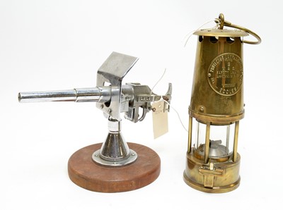 Lot 517 - Eccles brass miners lamp and another