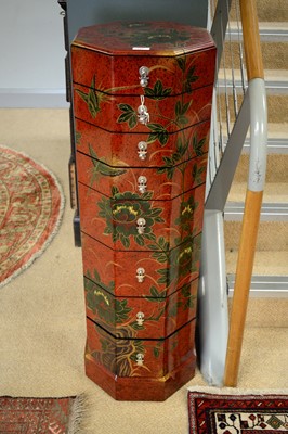 Lot 127 - A pair of Chinese octagonal red lacquer chests of drawers.