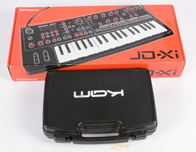 Lot 363 - Rowland JD-Xi Synthesizer and KAM wireless microphone system