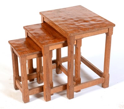 Lot 570 - Robert 'Mouseman' Thompson of Kilburn: a nest of three oak occasional tables