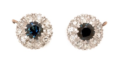 Lot 82 - A pair of sapphire and diamond cluster earrings