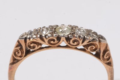 Lot 236 - A five stone diamond ring.