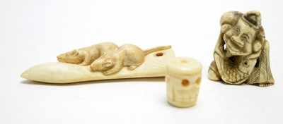 Lot 260 - Two Japanese netsuke and a toggle