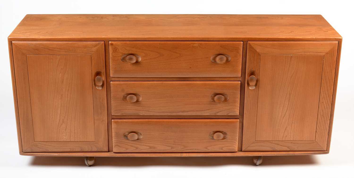 Lot 53 - Ercol: an elm Model 455 sideboard.