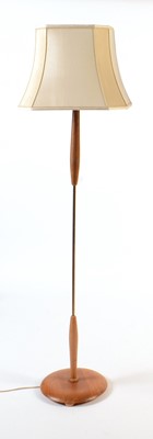 Lot 38 - A 20th Century teak and metal lamp standard.