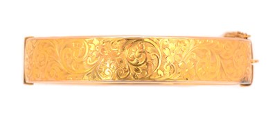 Lot 135 - A 9ct yellow gold bangle, by Lawson Ward & Gammage