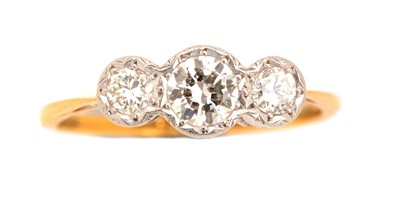 Lot 136 - A three stone diamond ring