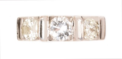 Lot 52 - A three stone diamond ring
