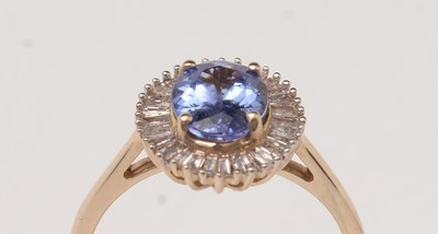 Lot 91 - A contemporary tanzanite and diamond dress ring.