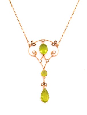 Lot 42 - An Edwardian peridot and seed pearl pendant
