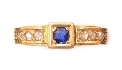 Lot 240 - A sapphire and diamond ring