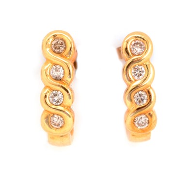 Lot 241 - A pair of diamond earrings