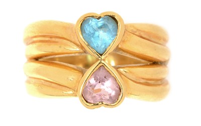 Lot 242 - A tourmaline and topaz ring