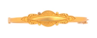 Lot 110 - A Victorian yellow metal bangle