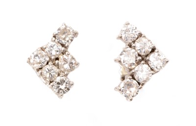 Lot 115 - A pair of diamond earrings