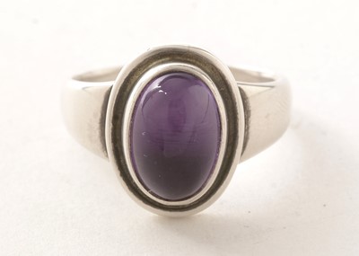 Lot 151 - A Georg Jensen amethyst cabochon ring.