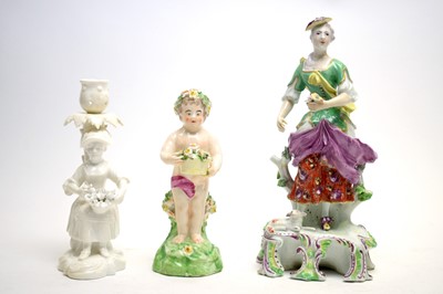 Lot 332 - Derby shepherdess, Derby putto and a Stevenson and Hancock candlestick figure.