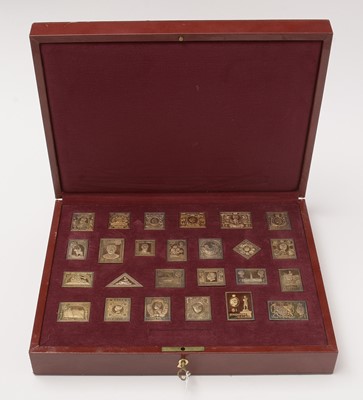 Lot 161 - "The Empire Collection" a limited-edition silver-gilt postage stamp ingot set.